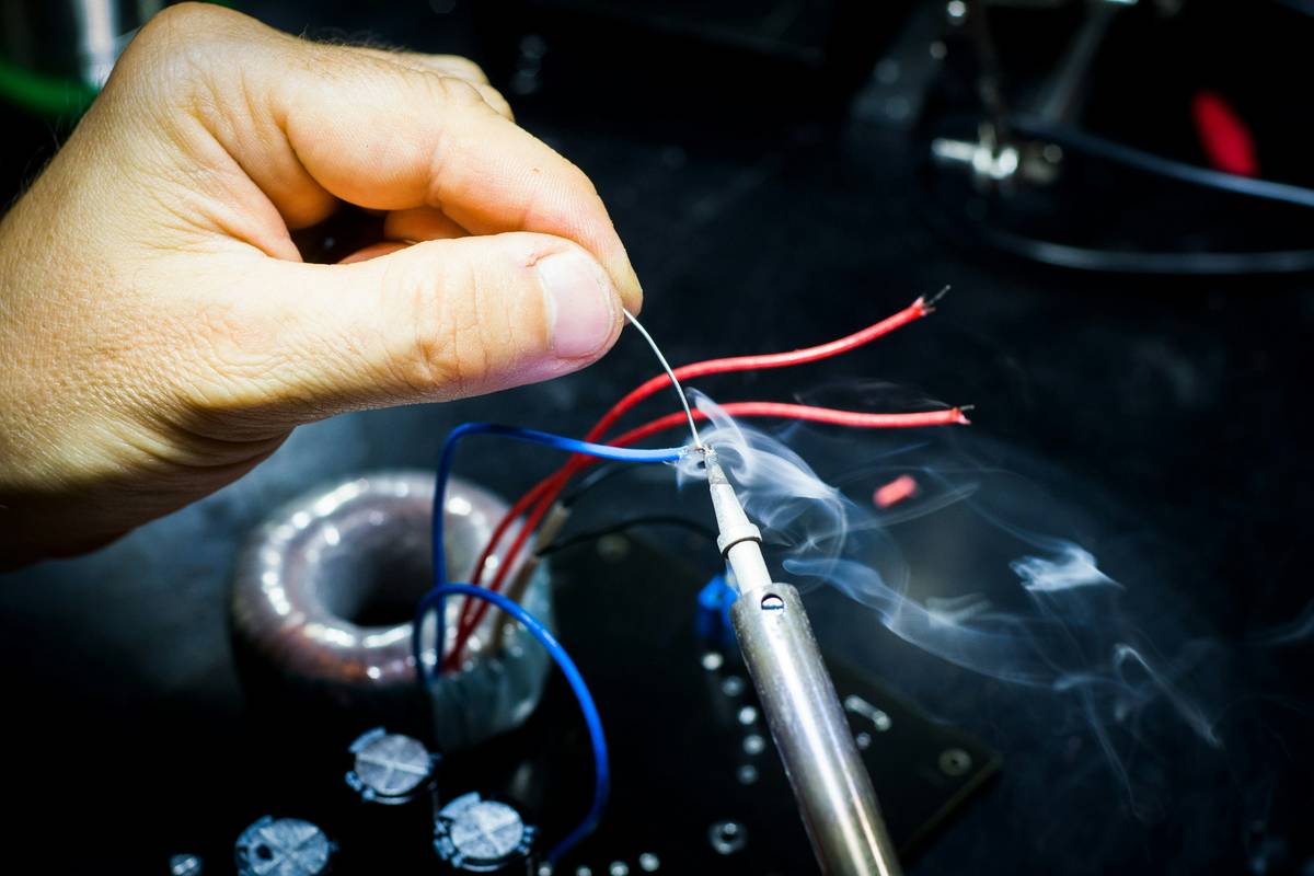 how to wire a curtain motor: close-up of color-coded wires connecting to a smart curtain motor terminal block