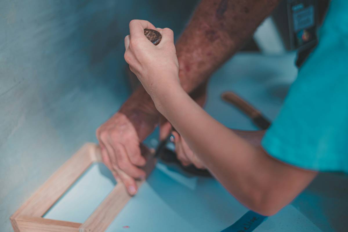 how to change a curtain motor – technician removing old motor from ceiling-mounted track system